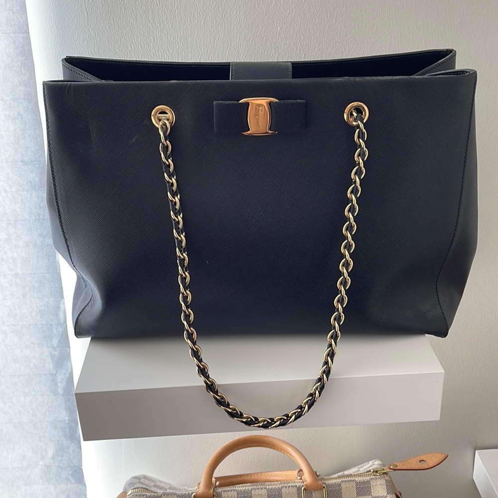 Black Ferragamo bag with gold detail